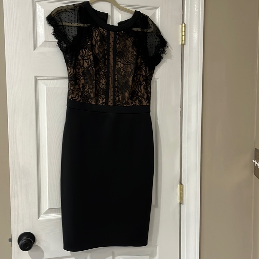 Wore once to a wedding.